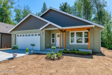 Outdoor adventure meets modern comfort in this beautifully on Sandpoint Elks Golf Course in Idaho - for sale on GolfHomes.com, golf home, golf lot
