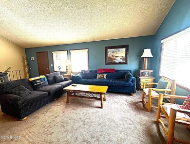 This 3bd/2ba Columbine Lake home on a 1/3 acre lot is situated on Grand Lake Golf Course in Colorado - for sale on GolfHomes.com, golf home, golf lot