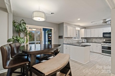 Welcome to this vintage gem on the peninsula in the heart of on Tega Cay Golf Club in South Carolina - for sale on GolfHomes.com, golf home, golf lot