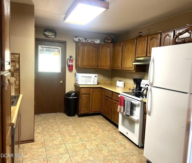 This 3bd/2ba Columbine Lake home on a 1/3 acre lot is situated on Grand Lake Golf Course in Colorado - for sale on GolfHomes.com, golf home, golf lot