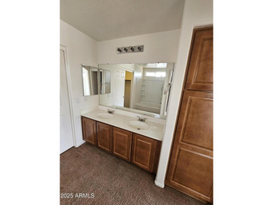 This oversized lot comes with a spacious 4-bedroom 3-bath home on Sundance Golf Club in Arizona - for sale on GolfHomes.com, golf home, golf lot