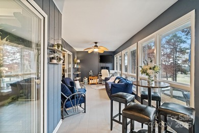 Welcome to this vintage gem on the peninsula in the heart of on Tega Cay Golf Club in South Carolina - for sale on GolfHomes.com, golf home, golf lot