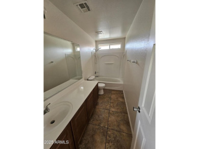This oversized lot comes with a spacious 4-bedroom 3-bath home on Sundance Golf Club in Arizona - for sale on GolfHomes.com, golf home, golf lot