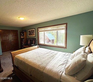 This 3bd/2ba Columbine Lake home on a 1/3 acre lot is situated on Grand Lake Golf Course in Colorado - for sale on GolfHomes.com, golf home, golf lot