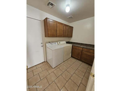 This oversized lot comes with a spacious 4-bedroom 3-bath home on Sundance Golf Club in Arizona - for sale on GolfHomes.com, golf home, golf lot