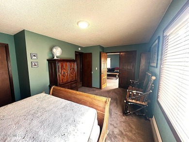This 3bd/2ba Columbine Lake home on a 1/3 acre lot is situated on Grand Lake Golf Course in Colorado - for sale on GolfHomes.com, golf home, golf lot