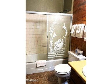 This 3bd/2ba Columbine Lake home on a 1/3 acre lot is situated on Grand Lake Golf Course in Colorado - for sale on GolfHomes.com, golf home, golf lot
