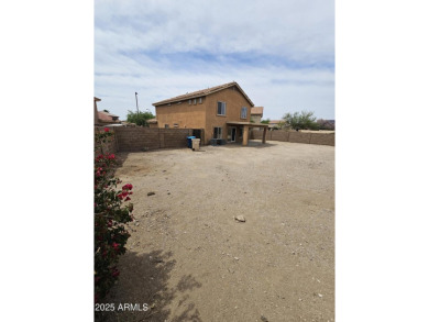 This oversized lot comes with a spacious 4-bedroom 3-bath home on Sundance Golf Club in Arizona - for sale on GolfHomes.com, golf home, golf lot