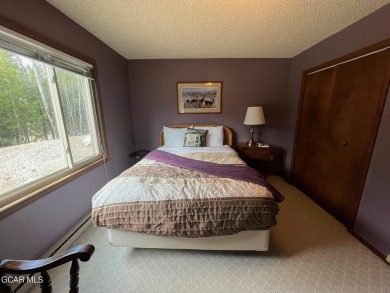 This 3bd/2ba Columbine Lake home on a 1/3 acre lot is situated on Grand Lake Golf Course in Colorado - for sale on GolfHomes.com, golf home, golf lot
