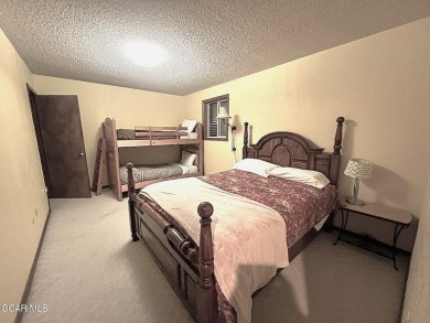This 3bd/2ba Columbine Lake home on a 1/3 acre lot is situated on Grand Lake Golf Course in Colorado - for sale on GolfHomes.com, golf home, golf lot