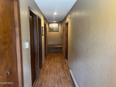 This 3bd/2ba Columbine Lake home on a 1/3 acre lot is situated on Grand Lake Golf Course in Colorado - for sale on GolfHomes.com, golf home, golf lot