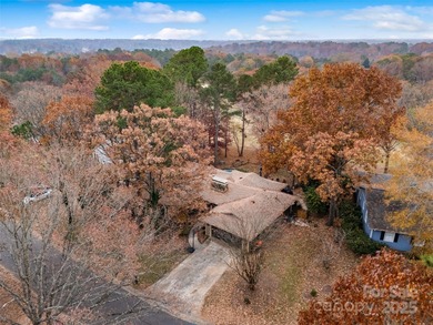 Welcome to this vintage gem on the peninsula in the heart of on Tega Cay Golf Club in South Carolina - for sale on GolfHomes.com, golf home, golf lot