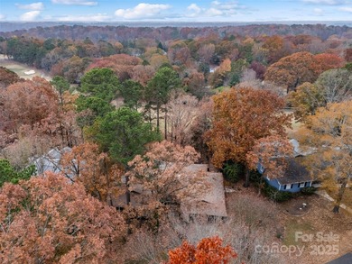 Welcome to this vintage gem on the peninsula in the heart of on Tega Cay Golf Club in South Carolina - for sale on GolfHomes.com, golf home, golf lot