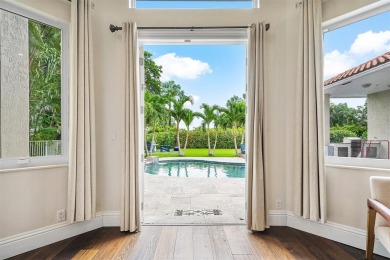 This one of a kind two story designer home was completely on Woodfield Country Club in Florida - for sale on GolfHomes.com, golf home, golf lot