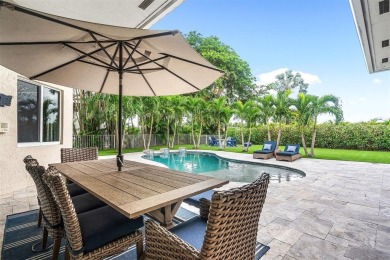 This one of a kind two story designer home was completely on Woodfield Country Club in Florida - for sale on GolfHomes.com, golf home, golf lot