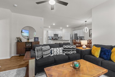 Nestled on a quiet cul-de-sac, this single-level four-bedroom on Harbour Point Golf Club in North Carolina - for sale on GolfHomes.com, golf home, golf lot