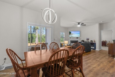 Nestled on a quiet cul-de-sac, this single-level four-bedroom on Harbour Point Golf Club in North Carolina - for sale on GolfHomes.com, golf home, golf lot