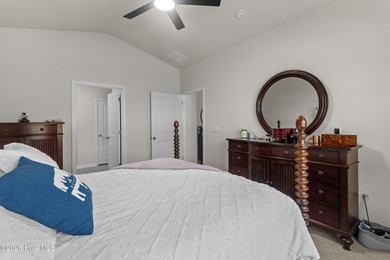 Nestled on a quiet cul-de-sac, this single-level four-bedroom on Harbour Point Golf Club in North Carolina - for sale on GolfHomes.com, golf home, golf lot