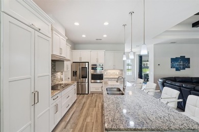 Built in 2020 by Vintage Estate Homes, this exceptional custom on Red Tail Golf Club in Florida - for sale on GolfHomes.com, golf home, golf lot