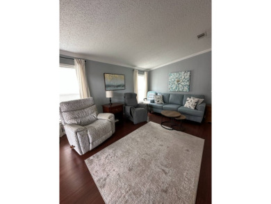 This charming and fully furnished 2-bedroom home is beautifully on Schalamar Creek Golf and Country Club in Florida - for sale on GolfHomes.com, golf home, golf lot
