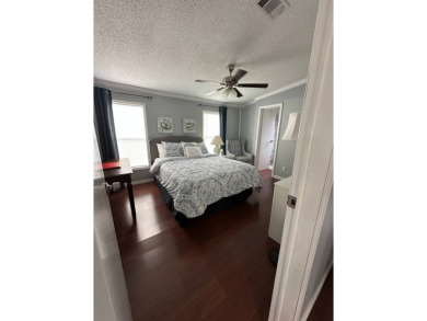 This charming and fully furnished 2-bedroom home is beautifully on Schalamar Creek Golf and Country Club in Florida - for sale on GolfHomes.com, golf home, golf lot