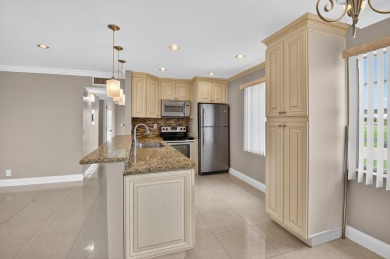 Must see this TOTALLY RENOVATED 2/2 second-floor corner condo on Kings Point Golf -Flanders Way in Florida - for sale on GolfHomes.com, golf home, golf lot
