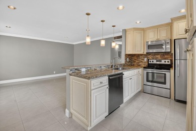 Must see this TOTALLY RENOVATED 2/2 second-floor corner condo on Kings Point Golf -Flanders Way in Florida - for sale on GolfHomes.com, golf home, golf lot