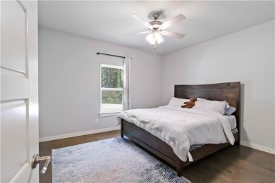 Step into comfort with this inviting 3-bedroom, 2-bath home on Bella Vista - Metfield Golf Complex and Country Club in Arkansas - for sale on GolfHomes.com, golf home, golf lot
