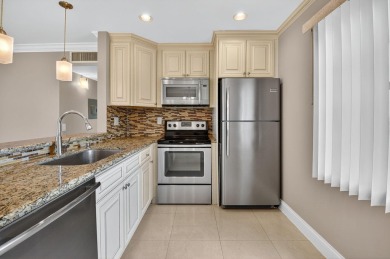 Must see this TOTALLY RENOVATED 2/2 second-floor corner condo on Kings Point Golf -Flanders Way in Florida - for sale on GolfHomes.com, golf home, golf lot