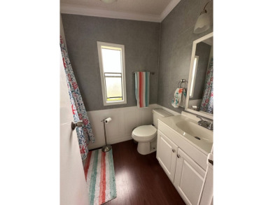 This charming and fully furnished 2-bedroom home is beautifully on Schalamar Creek Golf and Country Club in Florida - for sale on GolfHomes.com, golf home, golf lot