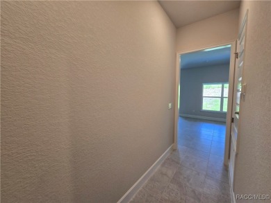 Handsome, inviting, and move-in ready, this 3-bedroom, 2-bath on Twisted Oaks Golf Club in Florida - for sale on GolfHomes.com, golf home, golf lot