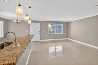 Must see this TOTALLY RENOVATED 2/2 second-floor corner condo on Kings Point Golf -Flanders Way in Florida - for sale on GolfHomes.com, golf home, golf lot