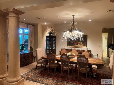 This stunning custom-built home is situated on an oversized on Rancho Viejo Resort and Country Club in Texas - for sale on GolfHomes.com, golf home, golf lot