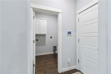 Step into comfort with this inviting 3-bedroom, 2-bath home on Bella Vista - Metfield Golf Complex and Country Club in Arkansas - for sale on GolfHomes.com, golf home, golf lot