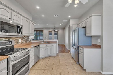 UPGRADED, low maintenance and professionally designed backyard on Sunland Springs Golf Course  in Arizona - for sale on GolfHomes.com, golf home, golf lot