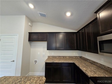 Handsome, inviting, and move-in ready, this 3-bedroom, 2-bath on Twisted Oaks Golf Club in Florida - for sale on GolfHomes.com, golf home, golf lot