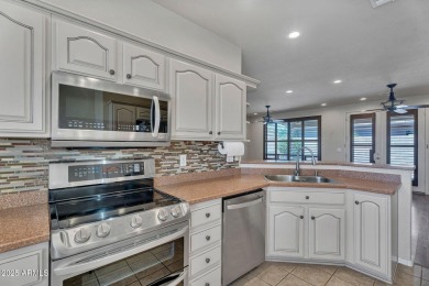 UPGRADED, low maintenance and professionally designed backyard on Sunland Springs Golf Course  in Arizona - for sale on GolfHomes.com, golf home, golf lot