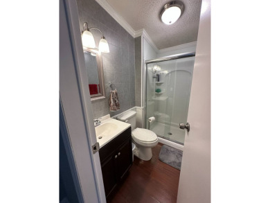 This charming and fully furnished 2-bedroom home is beautifully on Schalamar Creek Golf and Country Club in Florida - for sale on GolfHomes.com, golf home, golf lot