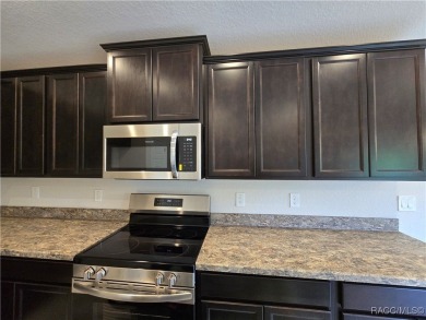 Handsome, inviting, and move-in ready, this 3-bedroom, 2-bath on Twisted Oaks Golf Club in Florida - for sale on GolfHomes.com, golf home, golf lot