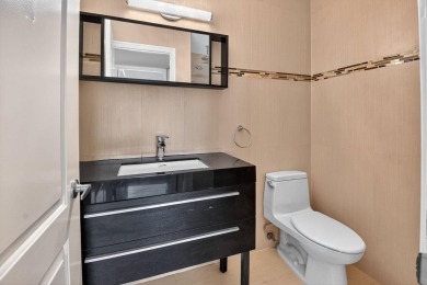 Must see this TOTALLY RENOVATED 2/2 second-floor corner condo on Kings Point Golf -Flanders Way in Florida - for sale on GolfHomes.com, golf home, golf lot