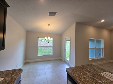Handsome, inviting, and move-in ready, this 3-bedroom, 2-bath on Twisted Oaks Golf Club in Florida - for sale on GolfHomes.com, golf home, golf lot