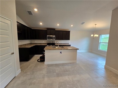 Handsome, inviting, and move-in ready, this 3-bedroom, 2-bath on Twisted Oaks Golf Club in Florida - for sale on GolfHomes.com, golf home, golf lot