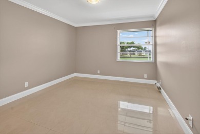Must see this TOTALLY RENOVATED 2/2 second-floor corner condo on Kings Point Golf -Flanders Way in Florida - for sale on GolfHomes.com, golf home, golf lot