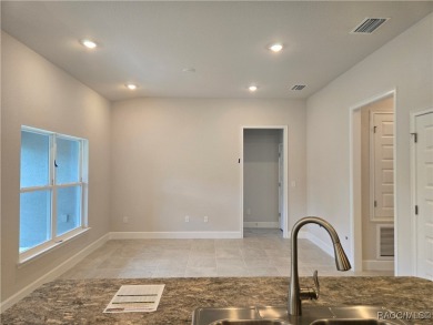 Handsome, inviting, and move-in ready, this 3-bedroom, 2-bath on Twisted Oaks Golf Club in Florida - for sale on GolfHomes.com, golf home, golf lot