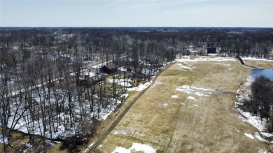 Premium wooded .69 acre lot in the prestigious Sanctuary section on Izatys Golf and Yacht Club in Minnesota - for sale on GolfHomes.com, golf home, golf lot
