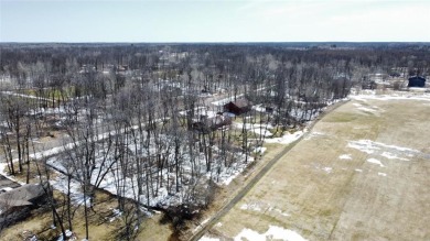 Premium wooded .69 acre lot in the prestigious Sanctuary section on Izatys Golf and Yacht Club in Minnesota - for sale on GolfHomes.com, golf home, golf lot