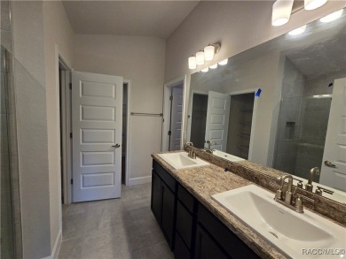 Handsome, inviting, and move-in ready, this 3-bedroom, 2-bath on Twisted Oaks Golf Club in Florida - for sale on GolfHomes.com, golf home, golf lot