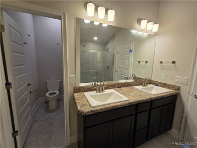 Handsome, inviting, and move-in ready, this 3-bedroom, 2-bath on Twisted Oaks Golf Club in Florida - for sale on GolfHomes.com, golf home, golf lot