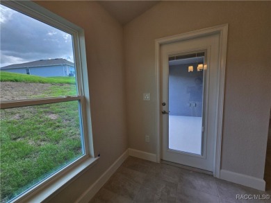 Handsome, inviting, and move-in ready, this 3-bedroom, 2-bath on Twisted Oaks Golf Club in Florida - for sale on GolfHomes.com, golf home, golf lot
