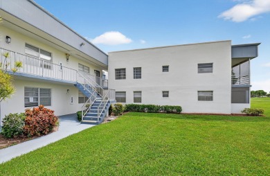 Must see this TOTALLY RENOVATED 2/2 second-floor corner condo on Kings Point Golf -Flanders Way in Florida - for sale on GolfHomes.com, golf home, golf lot